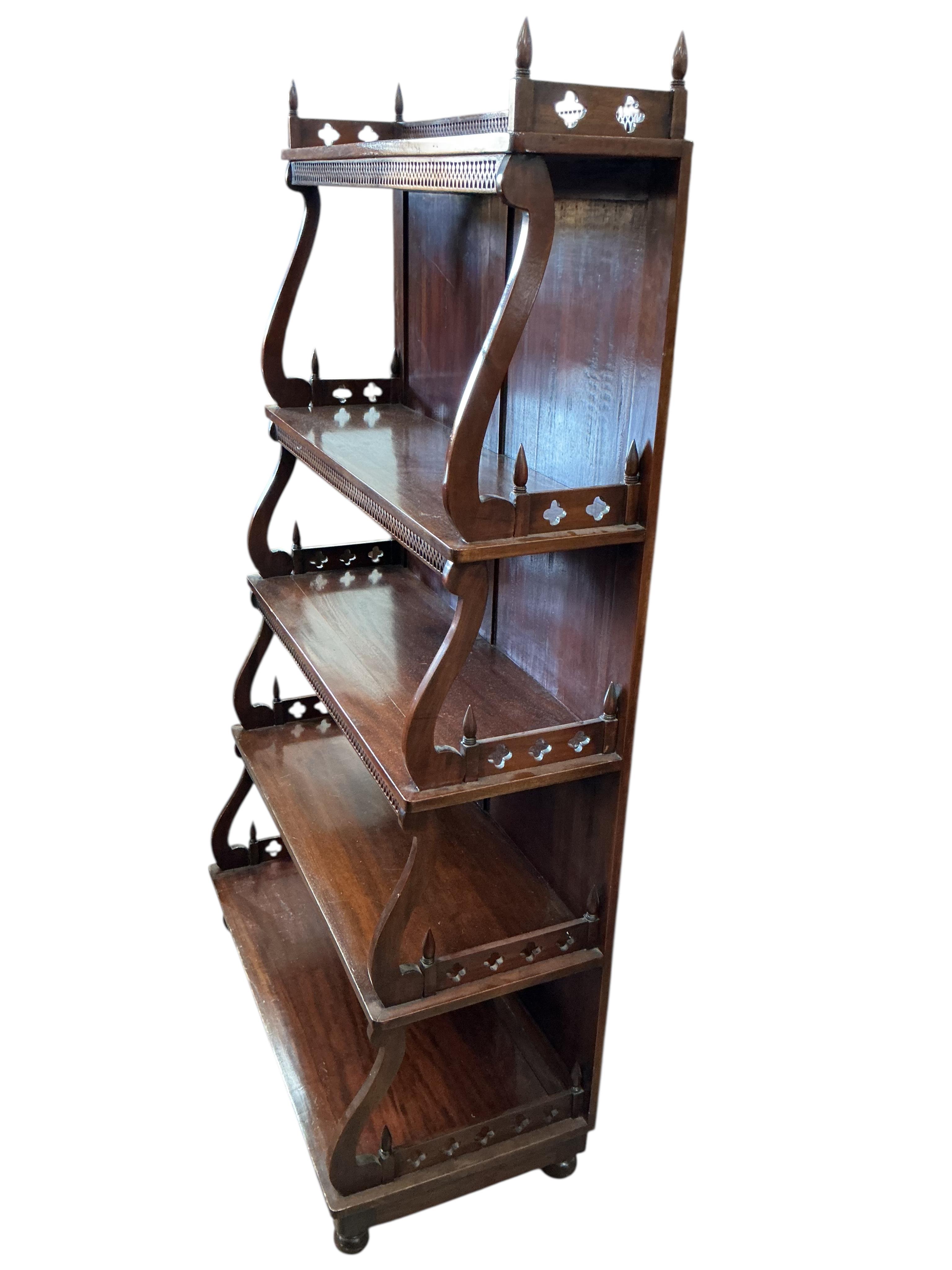 A Regency style mahogany graduated open bookcase, width 90cm, depth 41cm, height 164cm